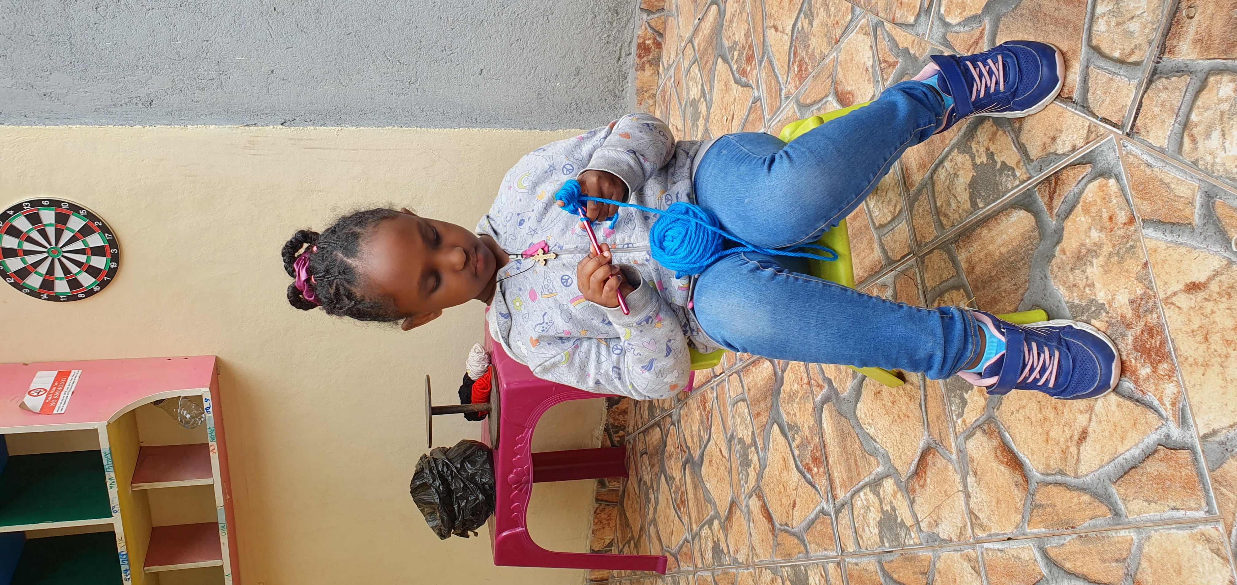 Summer camp kids doing pottery